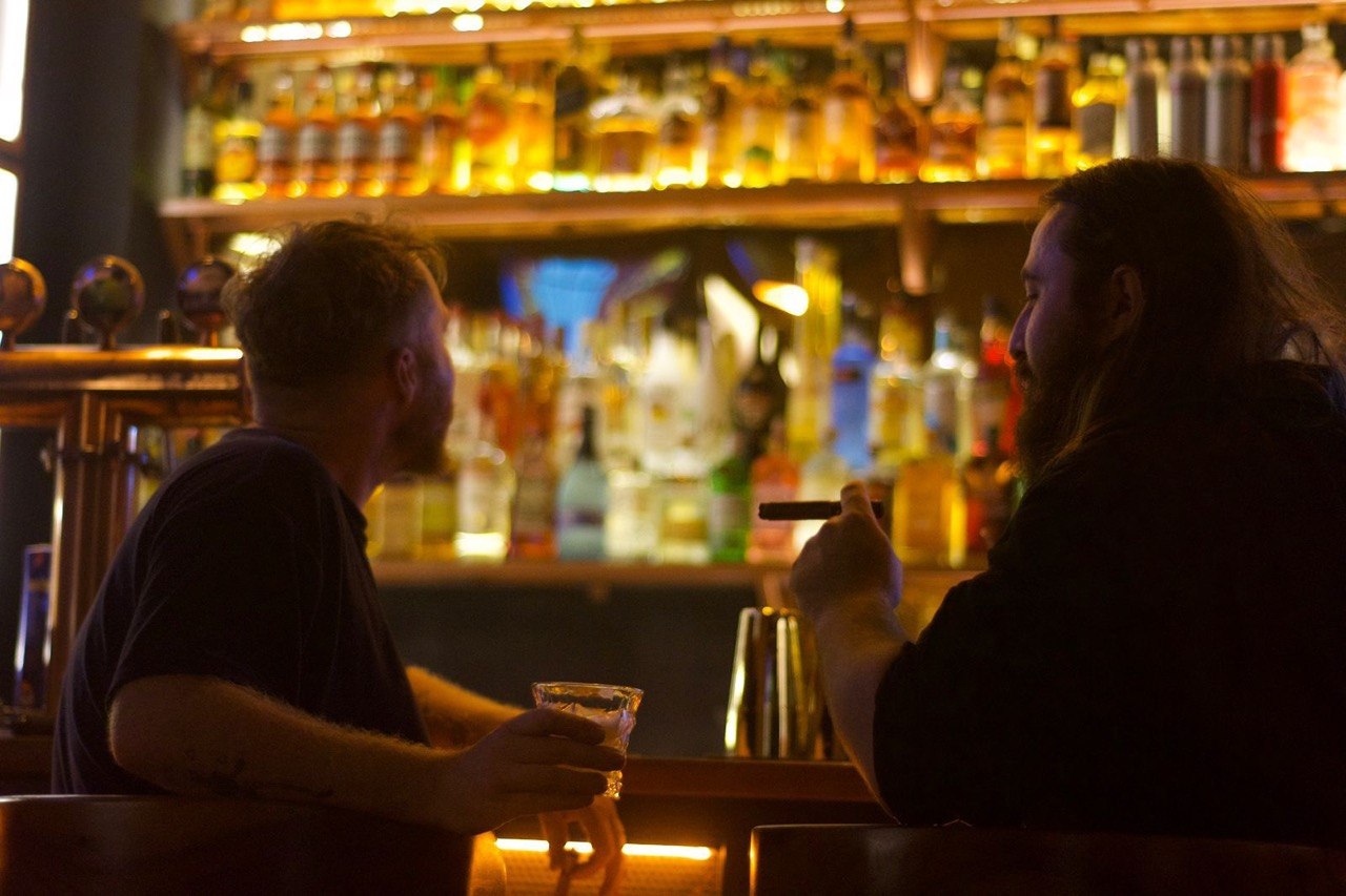 Guests hanging out at Drunken Monkey Bar in Siem Reap